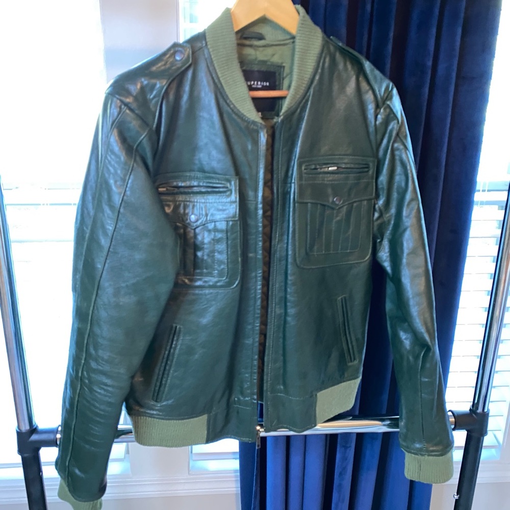 Green leather jacket with a nice fit for women.
